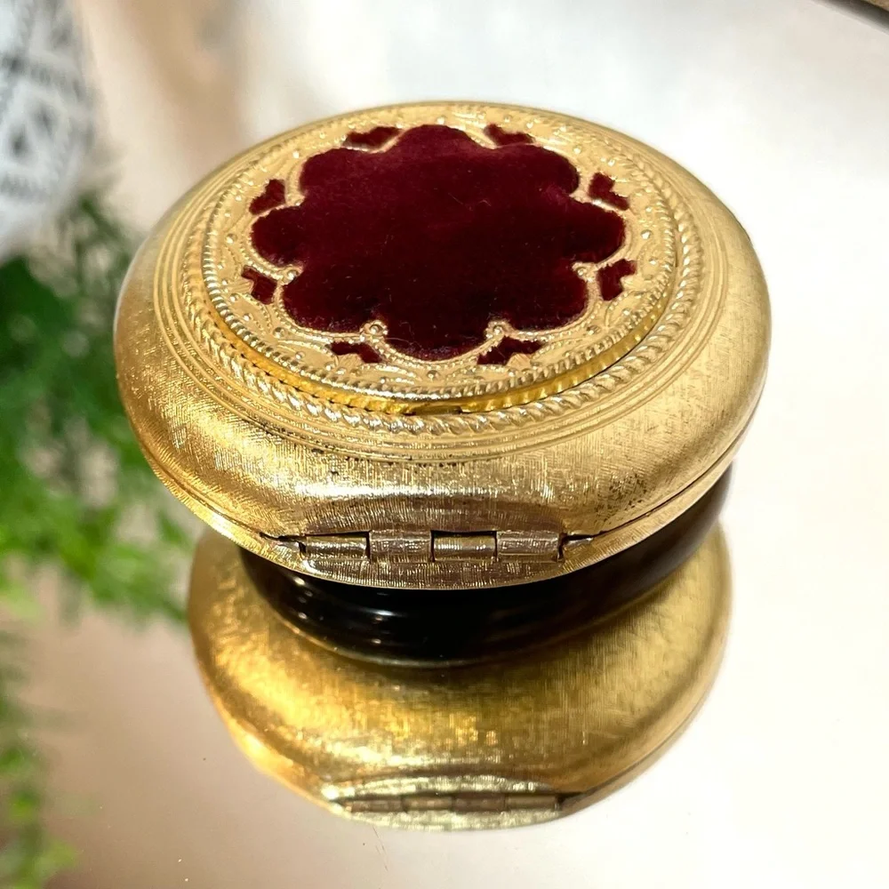 Vintage Revlon “Love Pat” Gold-tone Powder Compact with Burgundy Velvet Accent.